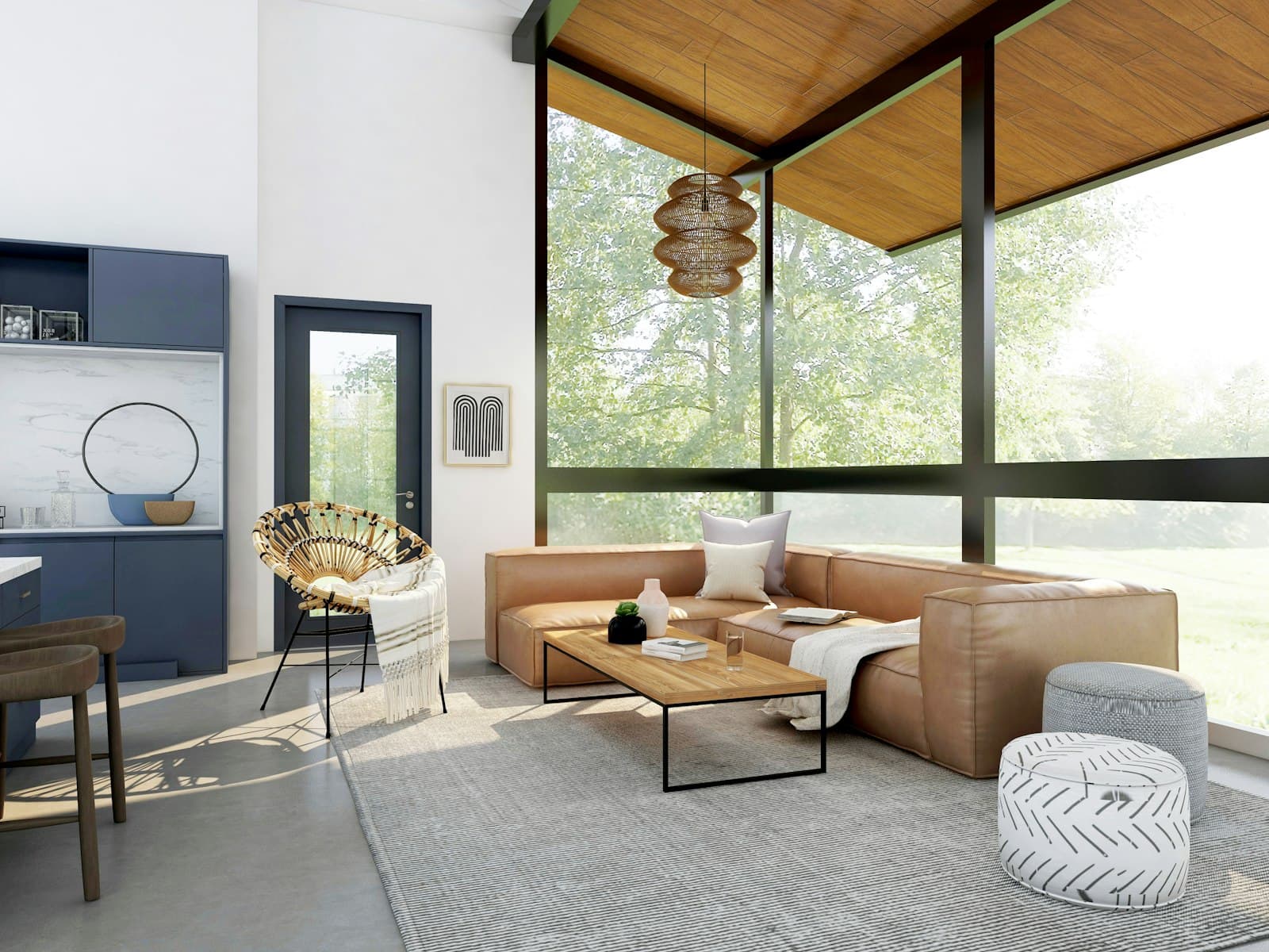 Sunlit sitting room opening to trees, with leather seating and a woven chair