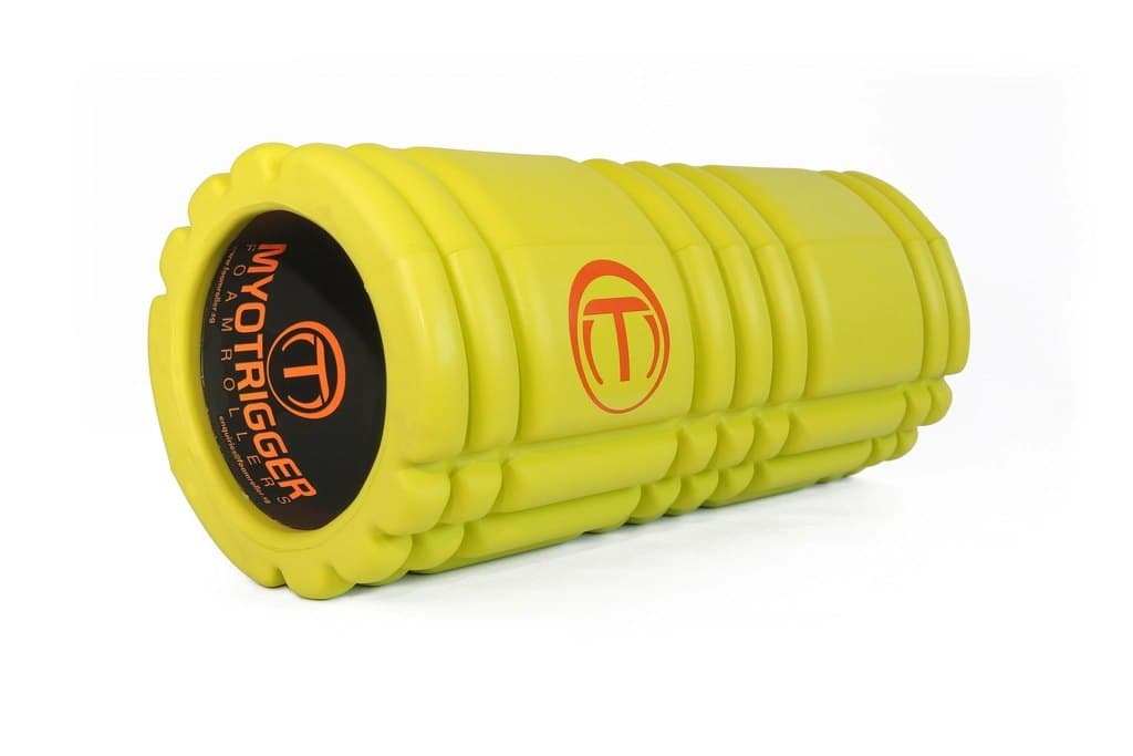 Chartreuse textured foam roller with ridged surface for muscle recovery