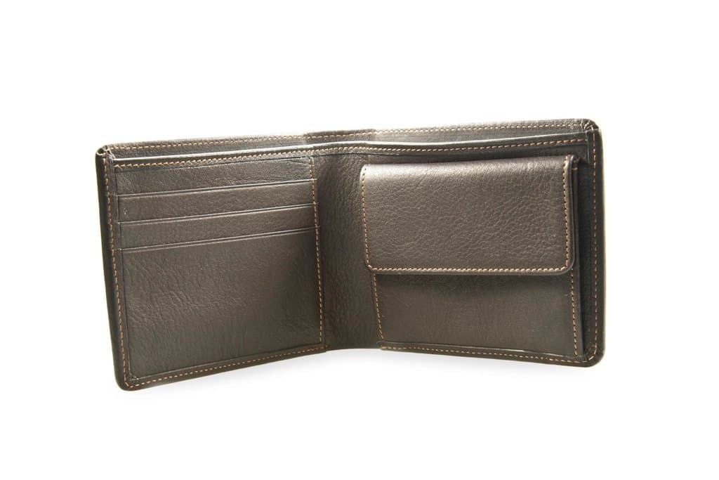 Slim brown leather bifold wallet on a dark surface