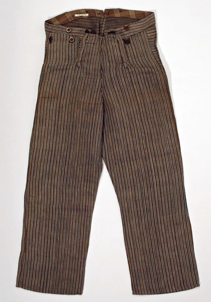 Vintage-inspired striped work trousers laid flat