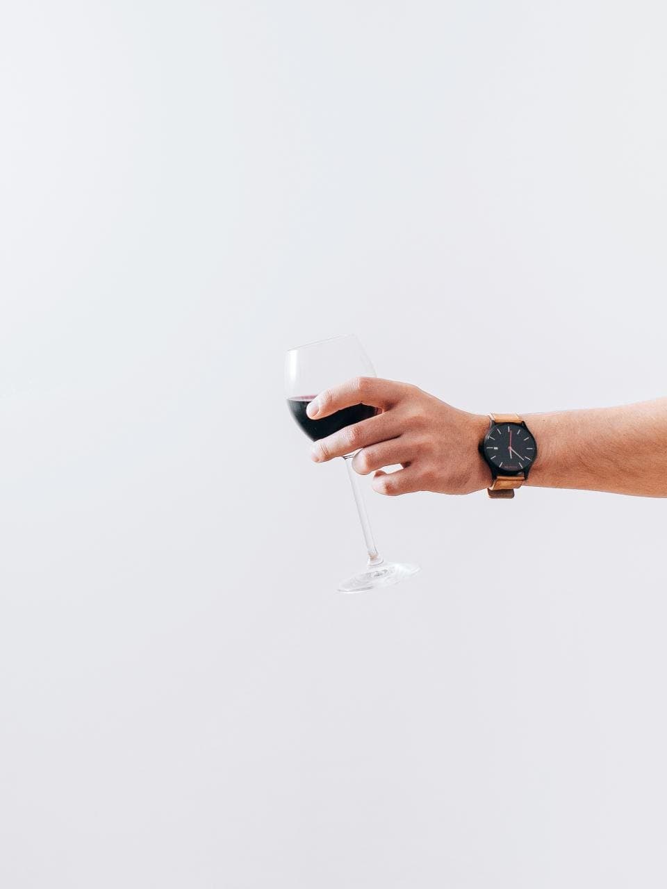 Clear wine glasses with a slender stem on a tabletop